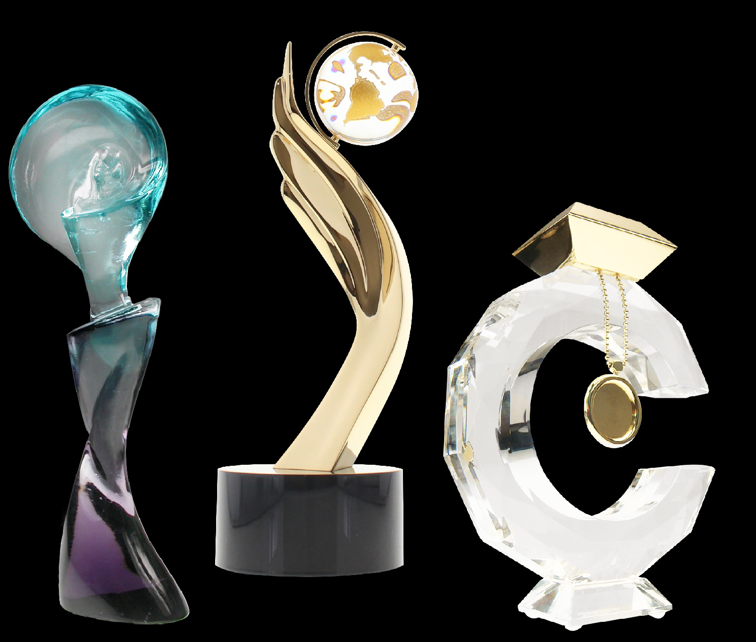 Three custom crystal awards using various techniques such as P&acirc;te de P&acirc;te de verre, gold electroplating, and custom shaping